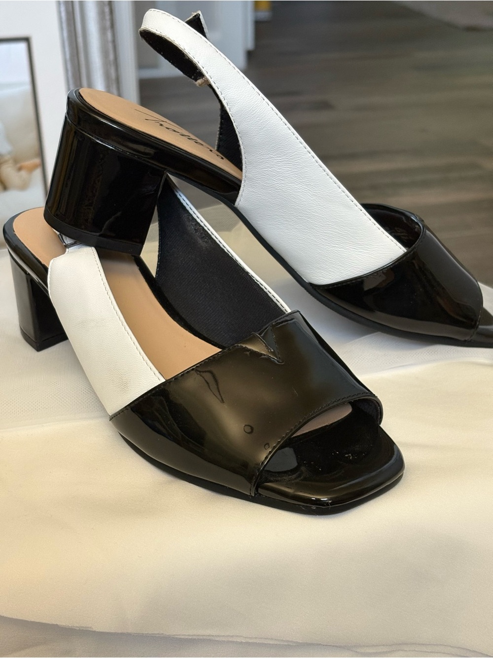 Black and white patent leather shoes